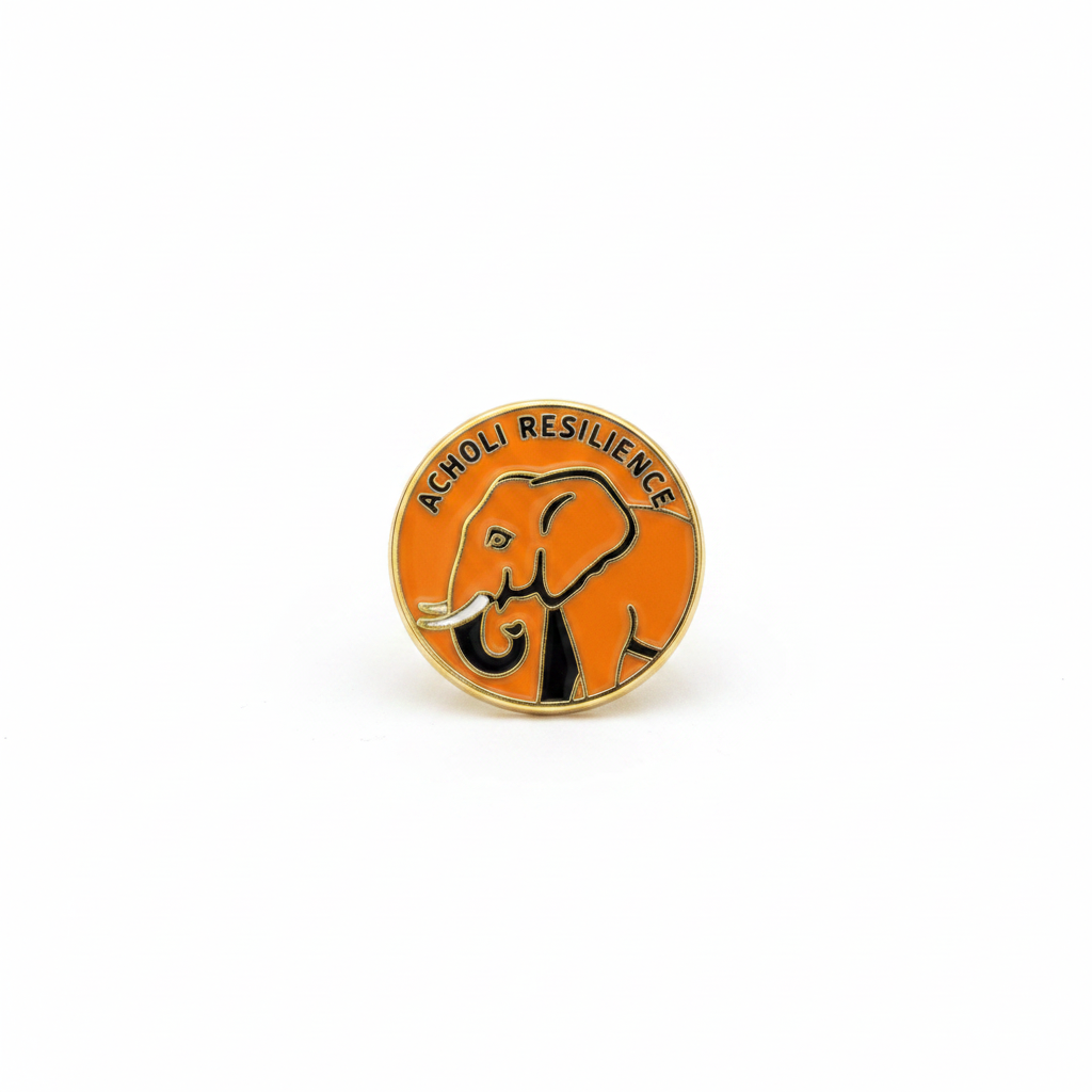 Elephant Enamel Pin — Studio shot — orange elephant enamel pin.