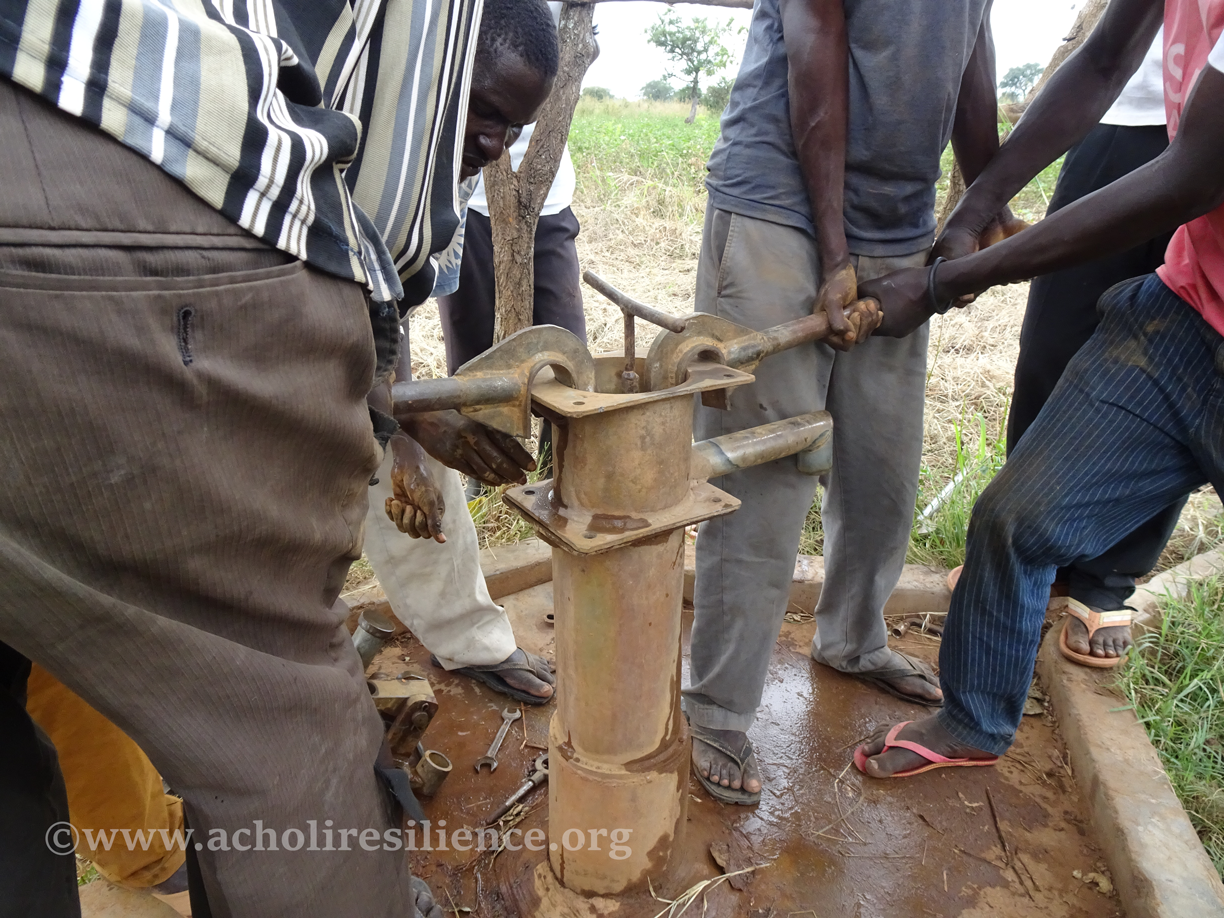 First flow — the moment a village becomes a place children can grow up in.